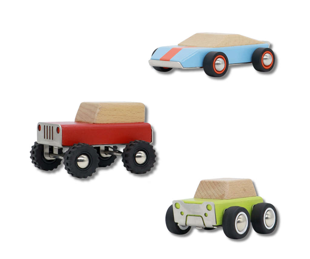 Three wooden toy cars on a white background