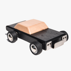 Wooden toy car with wooden top and black body on a white background