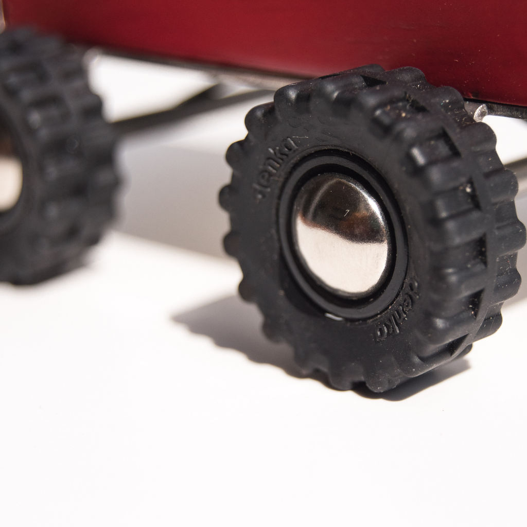 Close-up of a black gear on a white background