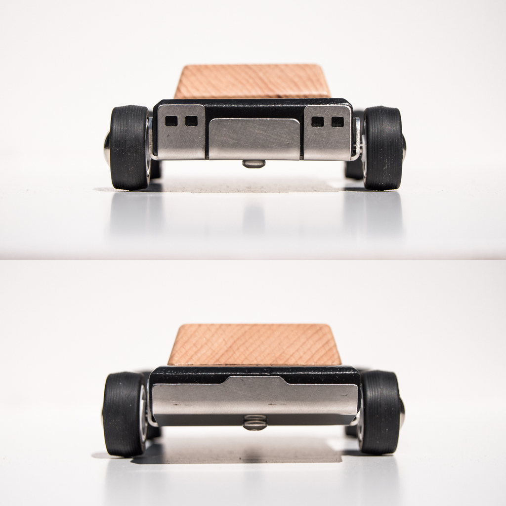 wooden toy car and metallic bottom on a white background