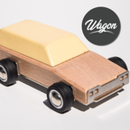 Wooden toy wagon with a beige top and black wheels on a light gray background.