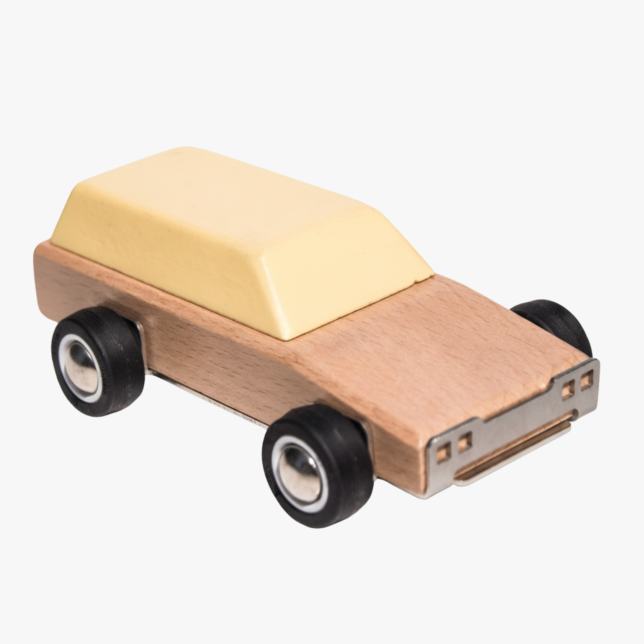 Wooden toy car with a yellow roof on a white background